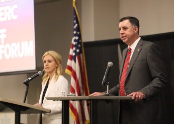 This is a picture of attorney general candidates Katherine Robertson and Jay Mitchell standing at podiums.
