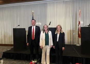 This is a picture of Jay Mitchell, Pamela Casey and Katherine Robertson standing together.