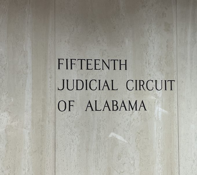 This is a sign that says FIFTEENTH JUDICIAL CIRCUIT OF ALABAMA