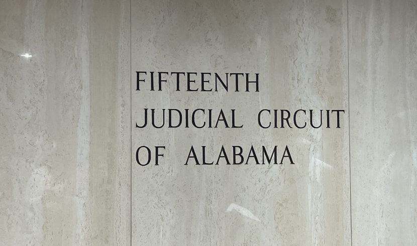 This is a sign that says FIFTEENTH JUDICIAL CIRCUIT OF ALABAMA