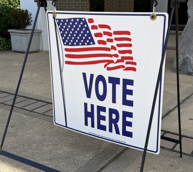 Vote here sign