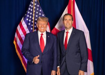 This is a picture of John Wahl and Donald Trump.