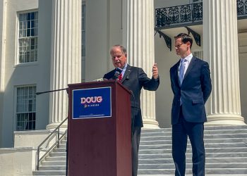 This is a photo of Phillip Ensler and Doug Jones on the Alabama State Capitol steps