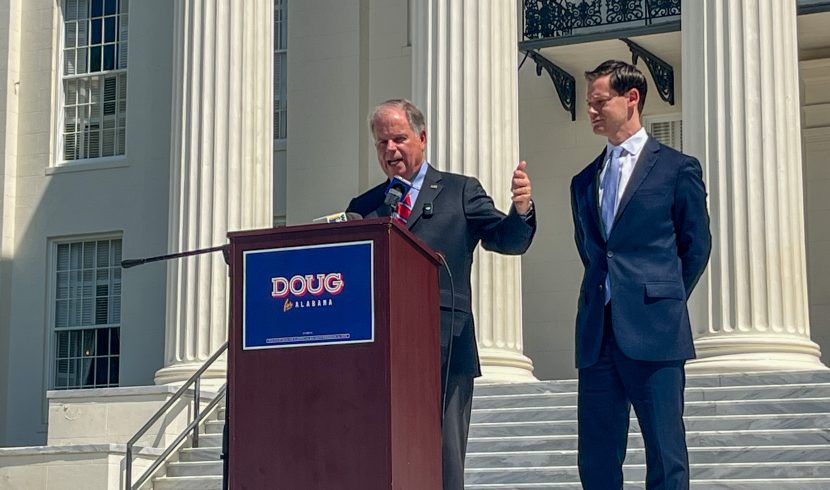 This is a photo of Phillip Ensler and Doug Jones on the Alabama State Capitol steps