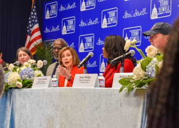 This is a picture of Nancy Pelosi speaking at a healthcare panel