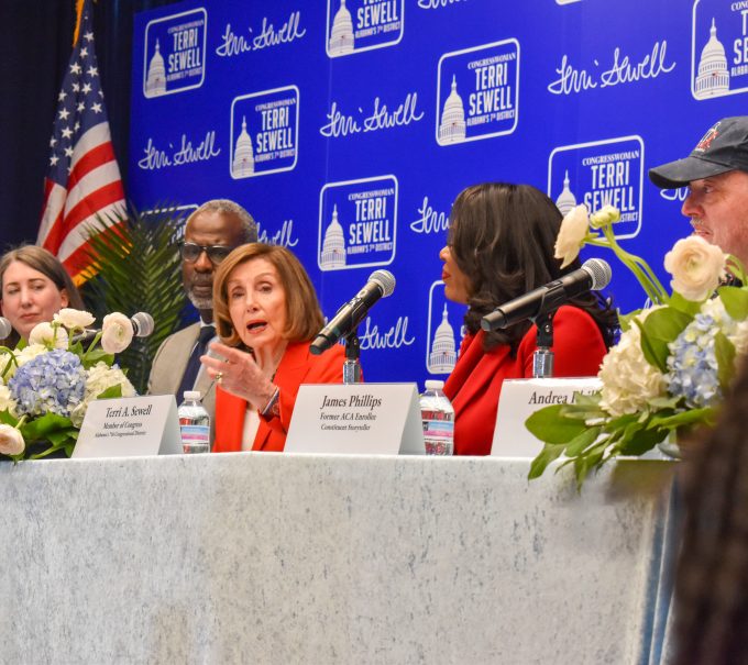 This is a picture of Nancy Pelosi speaking at a healthcare panel
