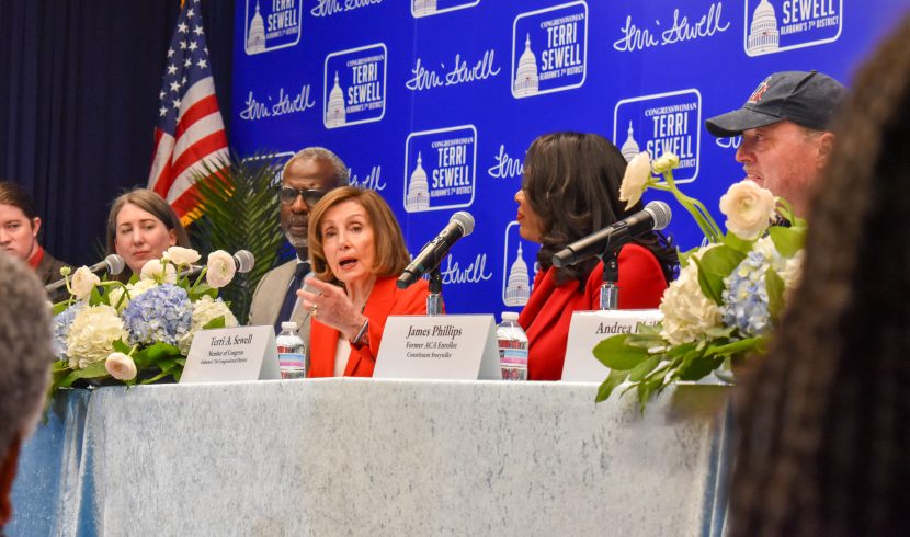 This is a picture of Nancy Pelosi speaking at a healthcare panel