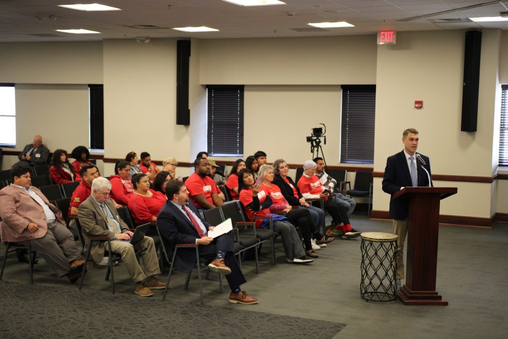 Shane Isner (right), pastor of First Christian Church, speaks during a public hearing of the House Judiciary Committee at the Alabama State House in Montgomery, April 9.
