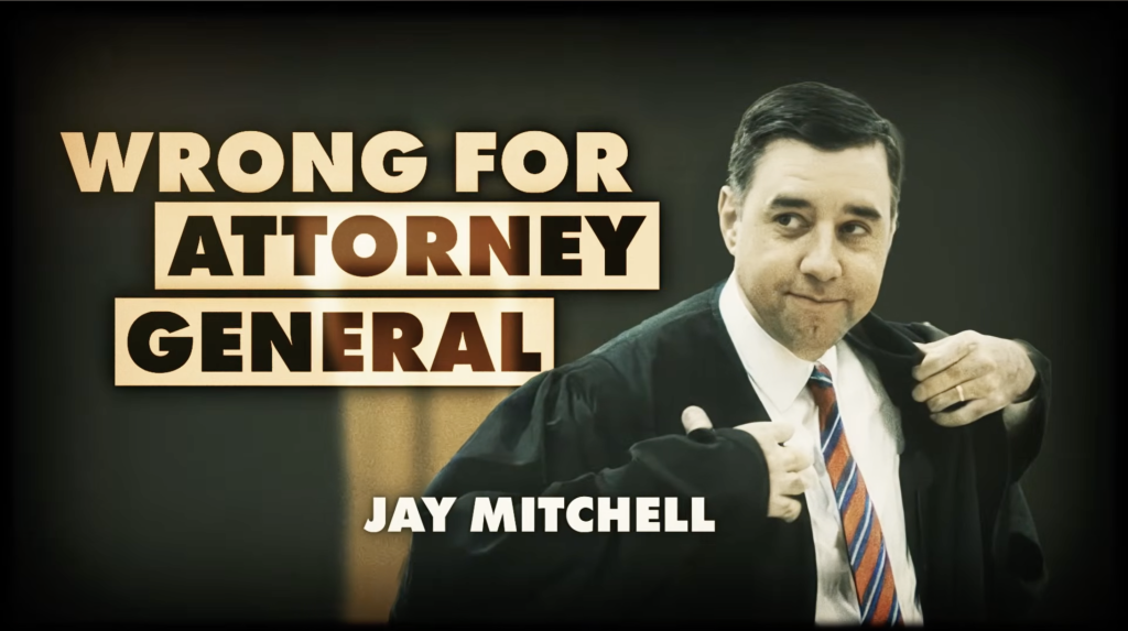 This is a picture of Jay Mitchell next to the words "WRONG FOR ATTORNEY GENERAL."